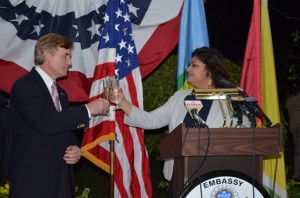Acting Minister of Foreign Minister Priya Manickchand and outgoing United States Ambassador to Guyana, Brent Hardt sharing a toast shortly after her stinging attack. 
