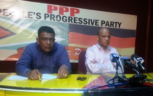 General Secretary of the PPP, Clement Rohee [right) and Party Member, Zulficar Mustapha. [iNews' Photo]