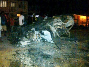 The burnt car following the accident. [Photo taken from Kaieteur News]