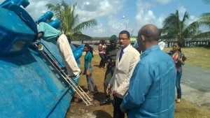 Head of CANU: James Singh and Minister Clement Rohee along with the media inspect the vessel