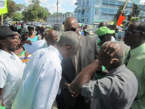 Opposition Leader, David Granger joins protesters outside of Parliament. [iNews' Photo]