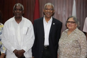 President David Granger [center) flanked by Robeson Benn [left) and Bibi Shadick, following the swearing in ceremony.